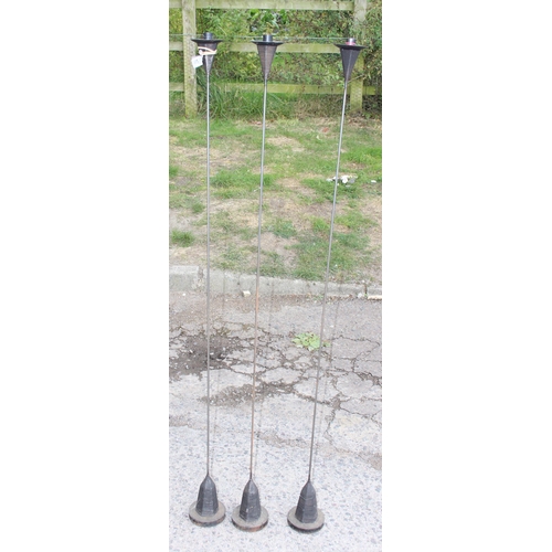 304 - A set of 3 unusual sprung metal candlesticks, approx 150cm tall