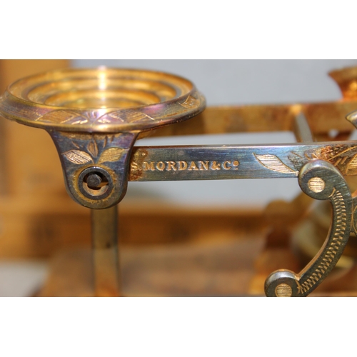 651 - A set of antique decorative brass and wooden letter scales with weights by Sampson Mordan