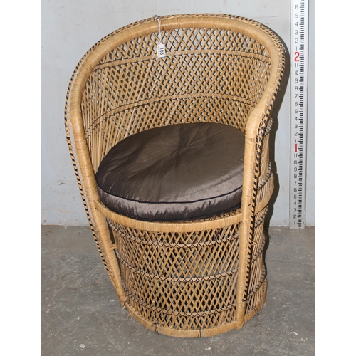 103 - A small wicker peacock chair