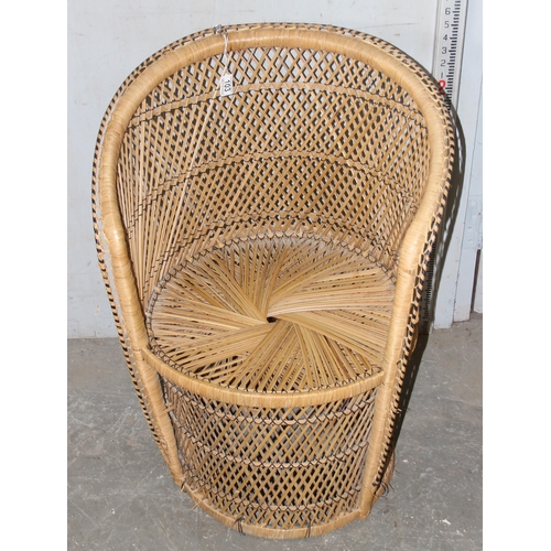 103 - A small wicker peacock chair