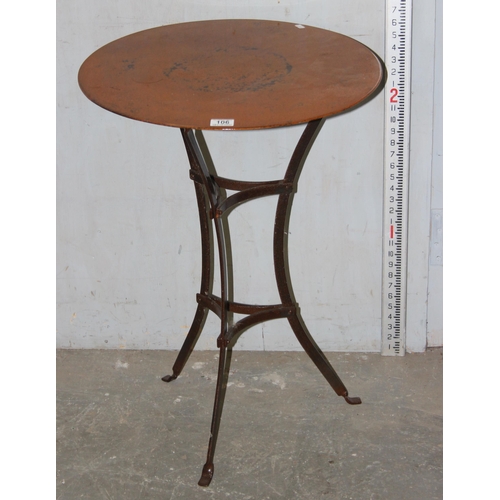 106 - An unusual vintage wrought metal and enamel topped table