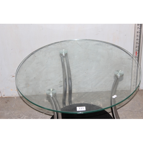 111 - A retro style glass and chrome coffee table