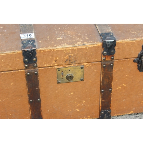 116 - A vintage wooden bound travel trunk with flat top