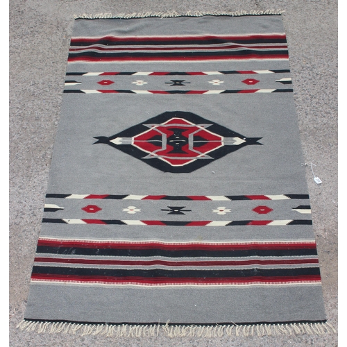 206 - A grey ground flatweave rug with geometric pattern, approx 210cm x 130cm