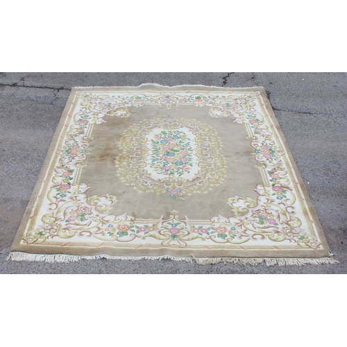 212 - A large Chinese super wash rug with thick pile and cream ground, approx 335cm x 280cm