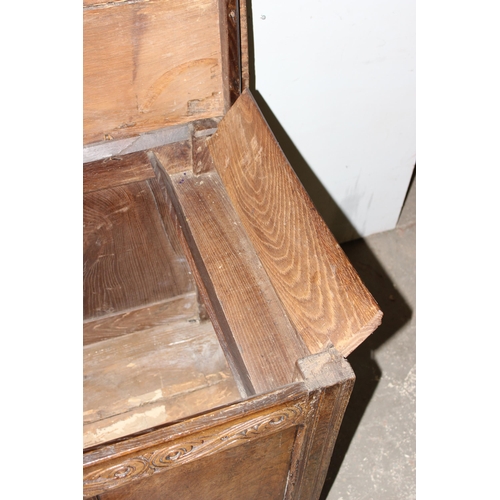 10 - Antique oak coffer with carved details and candle box to interior, 18th century or earlier, approx 1... 