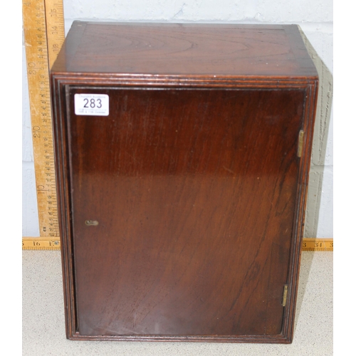 283 - A vintage mahogany wall cabinet