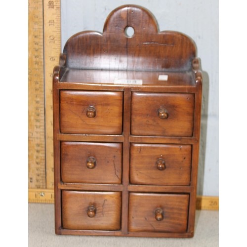 284 - A small vintage wooden 6 drawer wall hanging cabinet