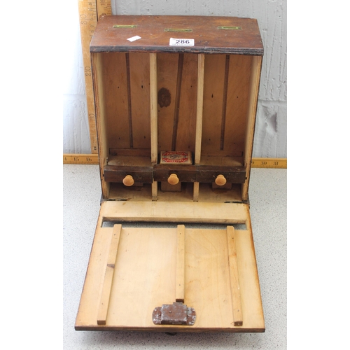 286 - A vintage homemade wooden matchbox dispensing machine with key, c.1930's