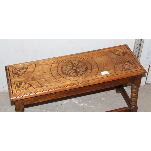 3 - A 17th century style oak low table or stool with carved details and bobbin turned legs