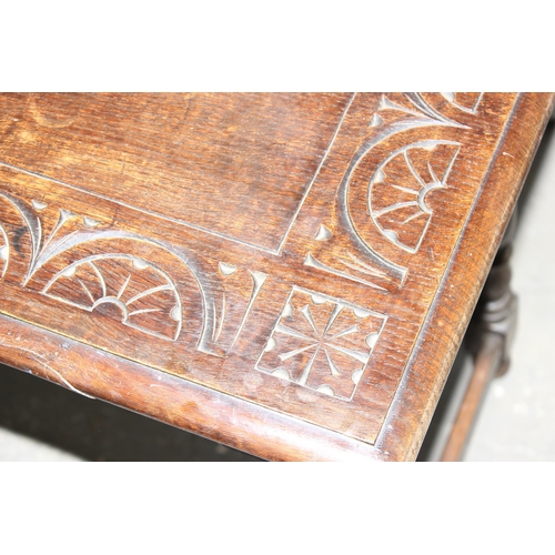 4 - A 17th century style oak side table with carved details