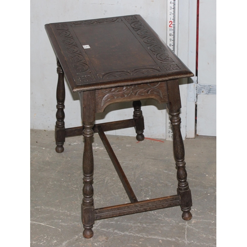 4 - A 17th century style oak side table with carved details