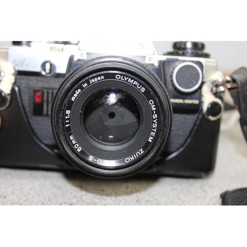 658 - Olympus OM10 camera with 50mm 1:1.8 lens & case