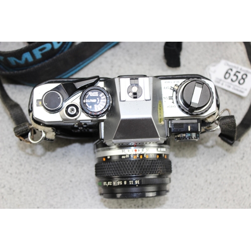 658 - Olympus OM10 camera with 50mm 1:1.8 lens & case