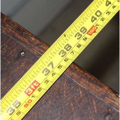 8 - An 18th century oak or elm 2 over 3 chest of drawers with brass handles and bracket feet, approx 96c... 