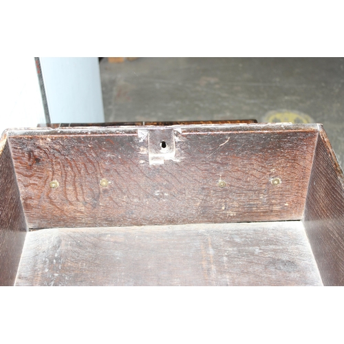 9 - An 18th century small oak sideboard with 2 deep drawers and brass handles, standing on cabriole legs... 