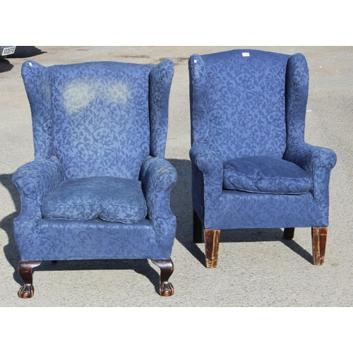 136 - 2 blue upholstered wingback armchairs, one with ball & claw feet, early 20th century or earlier