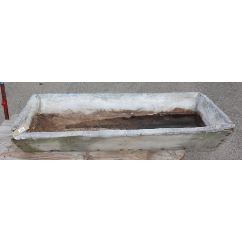 321 - A large lead lined sink with wooden carcass, approx 151cm x 75cm