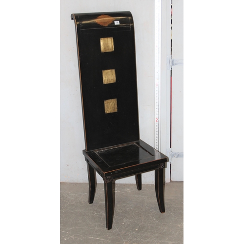 140 - An unusual Chinese ebonised high back wooden chair with brass scripted panels, approx 150cm tall