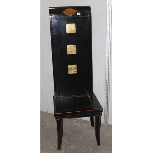 140 - An unusual Chinese ebonised high back wooden chair with brass scripted panels, approx 150cm tall