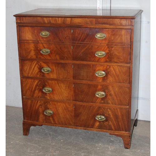 147 - A 19th century 4 drawer chest of drawers with brass handles, the top drawer being a secrétaire desk ... 