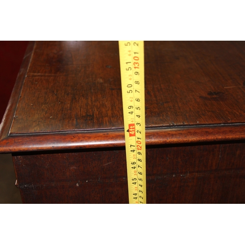 147 - A 19th century 4 drawer chest of drawers with brass handles, the top drawer being a secrétaire desk ... 