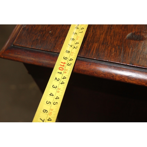 147 - A 19th century 4 drawer chest of drawers with brass handles, the top drawer being a secrétaire desk ... 