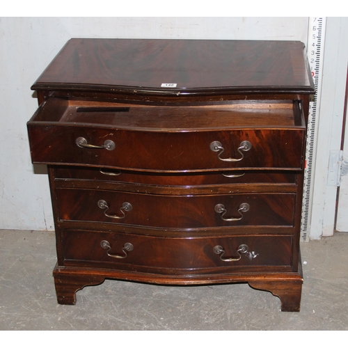 148 - A 20th century mahogany effect serpentine 4 drawer chest of drawers