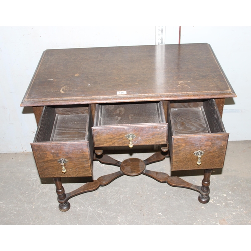 150 - A 17th century style oak lowboy with 3 drawers and X stretcher