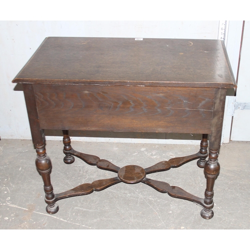 150 - A 17th century style oak lowboy with 3 drawers and X stretcher