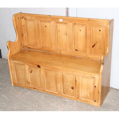 154 - A vintage pine settle bench with storage, approx 122cm wide