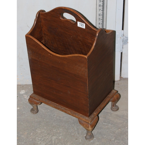 133 - 1930’s solid oak magazine rack with carrying handle on feet