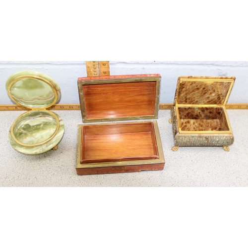 1788 - Three decorative retro polished coloured stone boxes of various designs with gilt mounts.