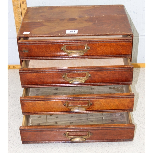 281 - 4 drawer vintage oak collectors cabinet with brass handles