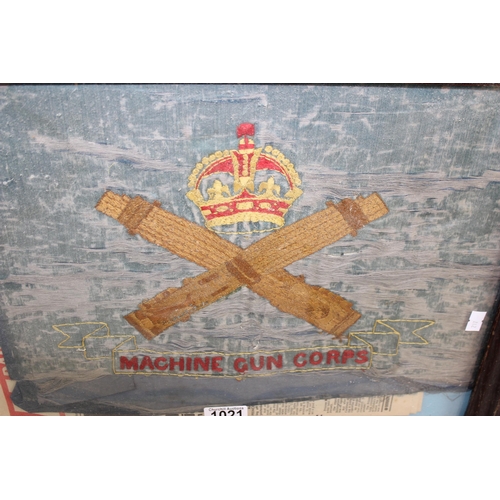 1021 - A WW1 period needlework embroidery, Machine Gun Corps crest, in frame