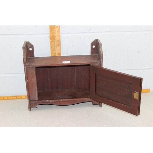 294 - A small antique wooden wall cabinet