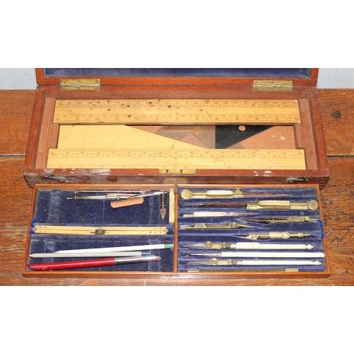 664 - A vintage mahogany boxed draftsman's set