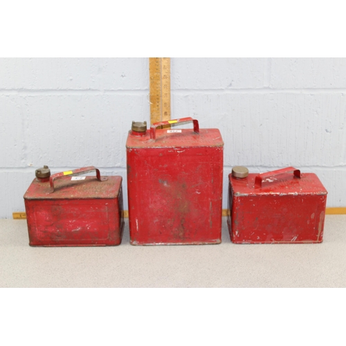 718 - 3 vintage red fuel cans