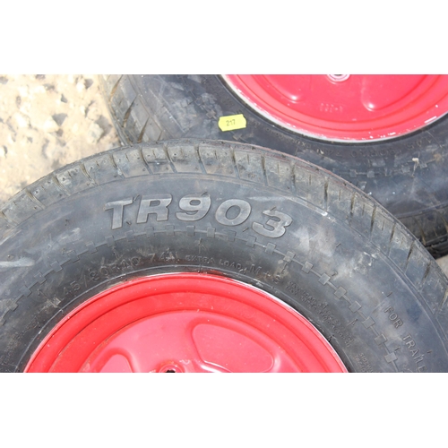 724 - 2 trailer tyres 145 / 80R10 and 2 tow hitches