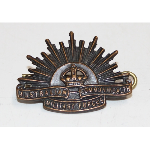 1014 - Qty of interesting military badges, sweetheart brooches, silver cased trench style watch, import mar... 