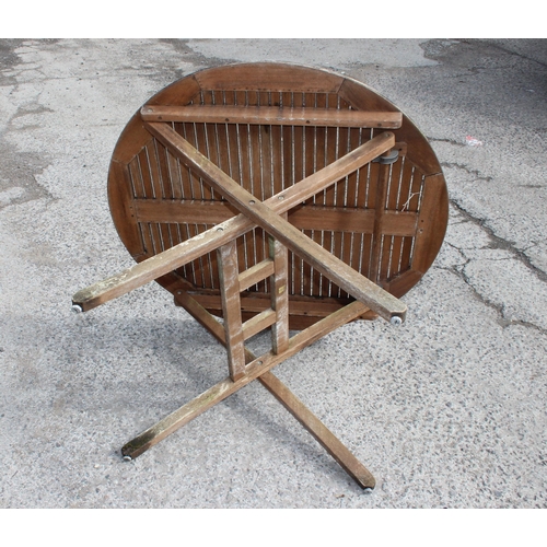 340 - Weathered teak garden table