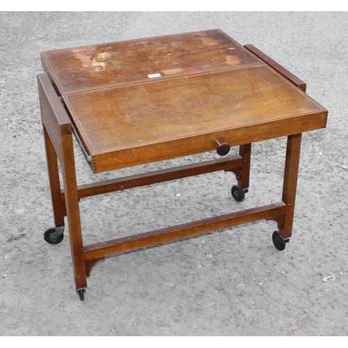 173 - A retro Besway metamorphic tea trolley, converting into a table, patent 276140 & 470409