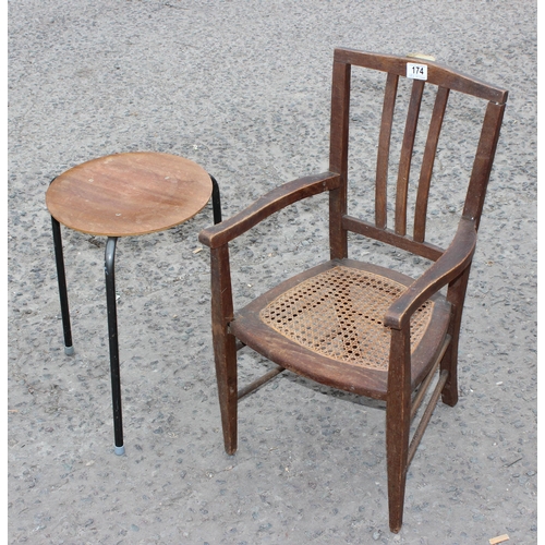 174 - A retro wooden topped and metal stool and a vintage cane seated child's chair