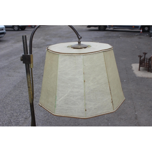 262 - A vintage French rise and fall library lamp with pig skin shade