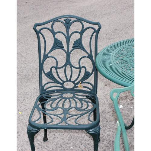 332 - A Coalbrookdale style aluminium garden table with 4 matched aluminium garden chairs