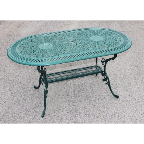 332 - A Coalbrookdale style aluminium garden table with 4 matched aluminium garden chairs