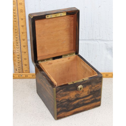 274 - An antique Coromandel box with brass fittings, approx 17cm cube