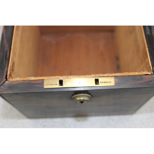 274 - An antique Coromandel box with brass fittings, approx 17cm cube