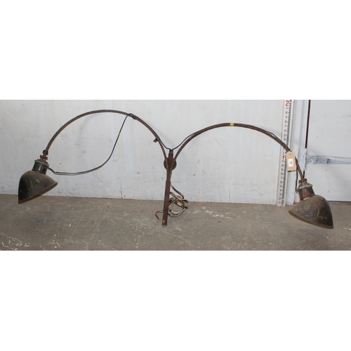 240A - A large vintage wrought iron industrial light fitting enamel shades