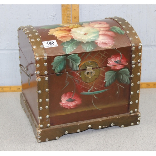 190 - A vintage hand painted wooden dome topped chest with floral decorations